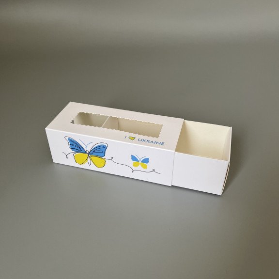 фото Коробка для макаронс з прозорим вікном типу "пенал" 141*59*49 Україна